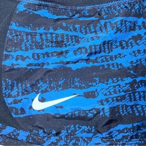 NIKE Sport Women's Dri-Fit Shorts (Michigan Wolverines)